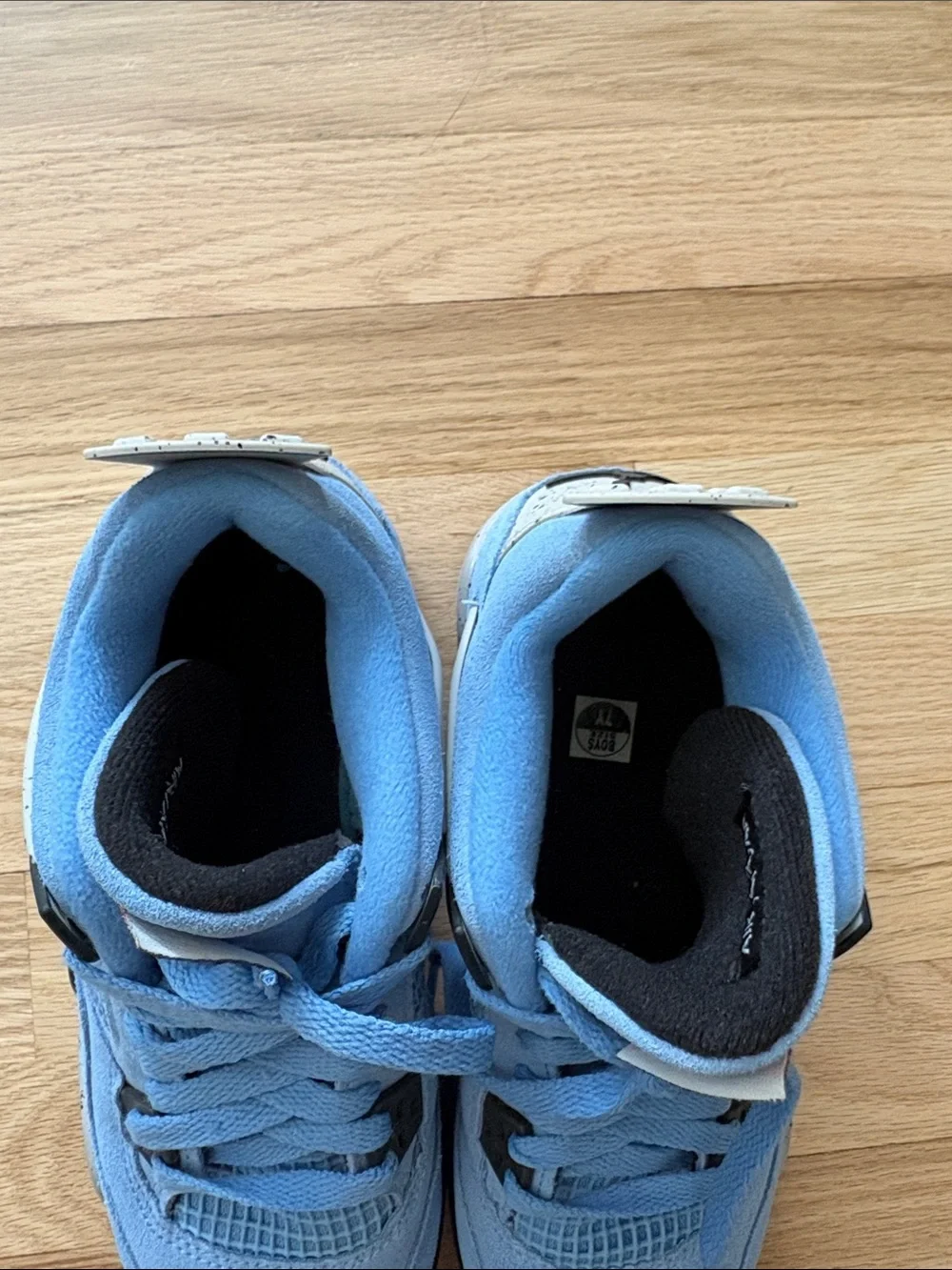 Air Jordan 4 Retro “University Blue” (also called Jordan 4 UNC/University Blue)